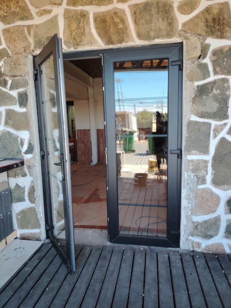 Puerta doble batiente